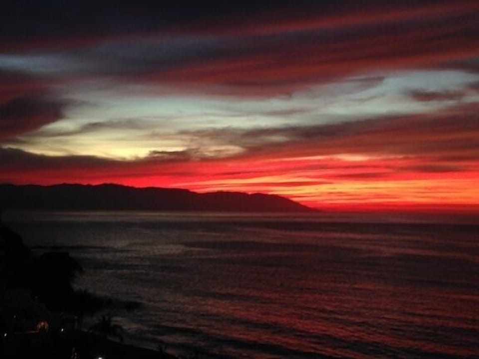 The perfect Vallartan sunset, as seen from the rooftaop terrace at Villa Blanca