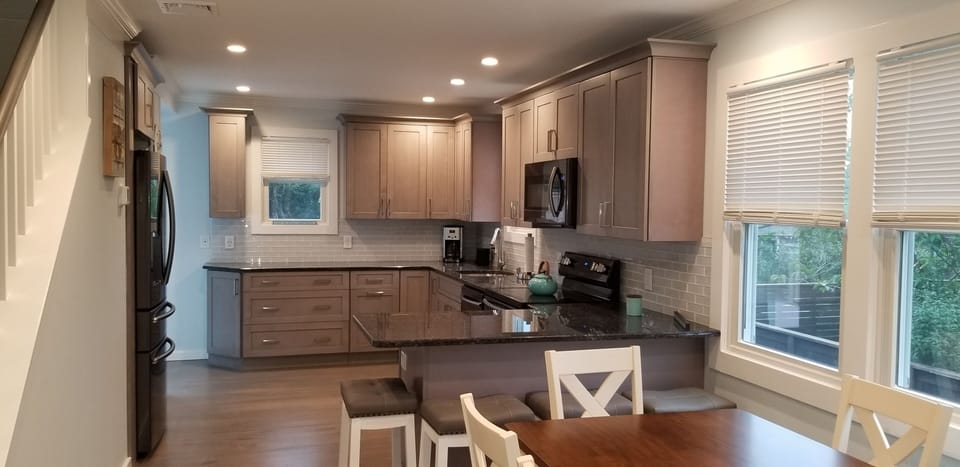All new kitchen with seating for 10.