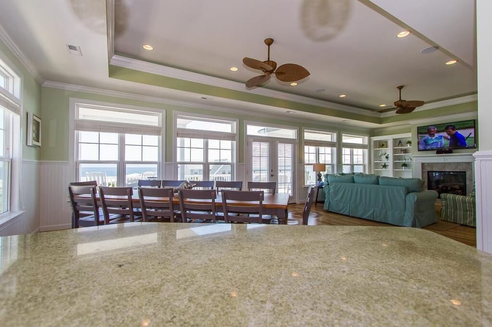 a big counter by the dining room makes serving meals a breeze