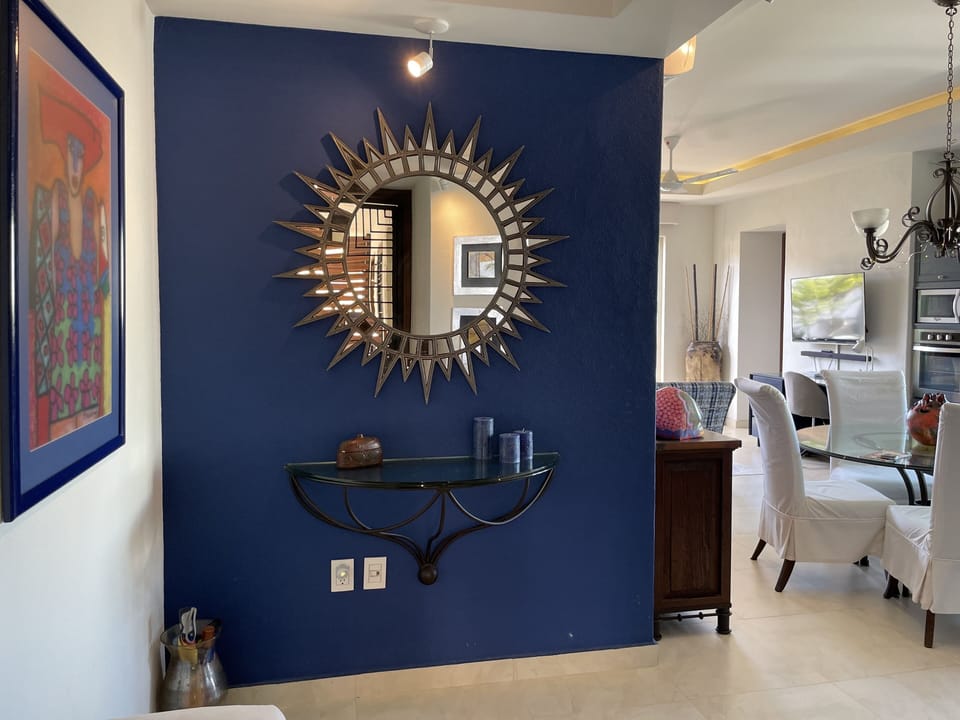 Foyer entry into spacious well appointed designer’s own vacation condo