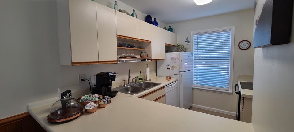 Well stocked kitchen with everything you need to prepare and enjoy meals at home