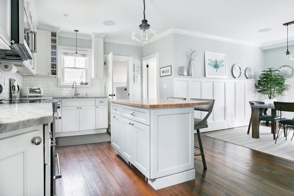 open concept kitchen/dining room/back porch
