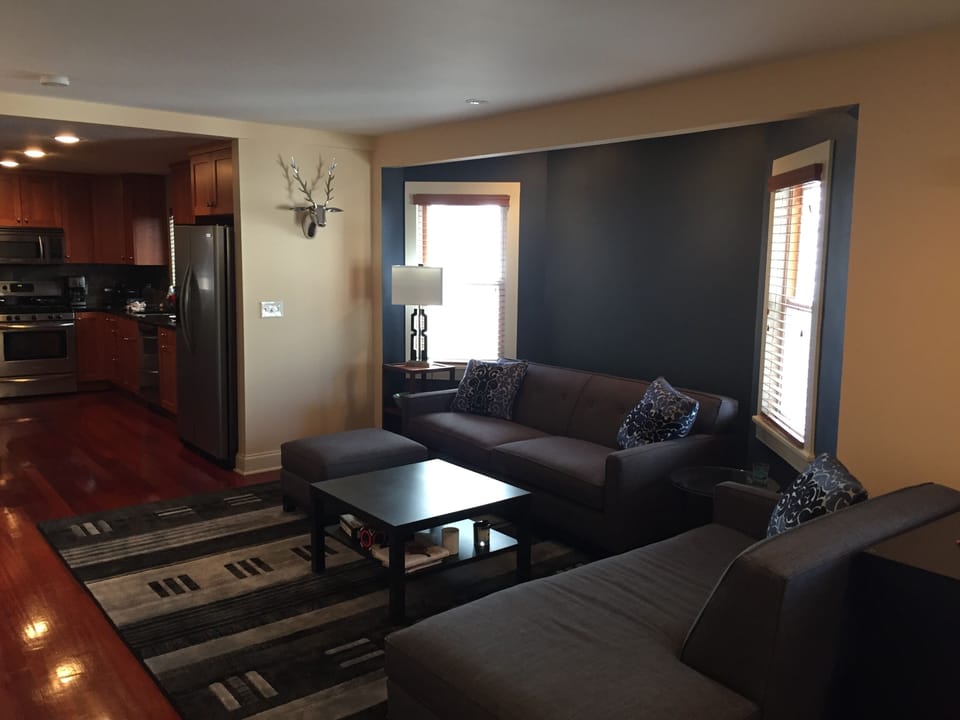 Living Room, large comfortable couch and seating area, television, speaker
