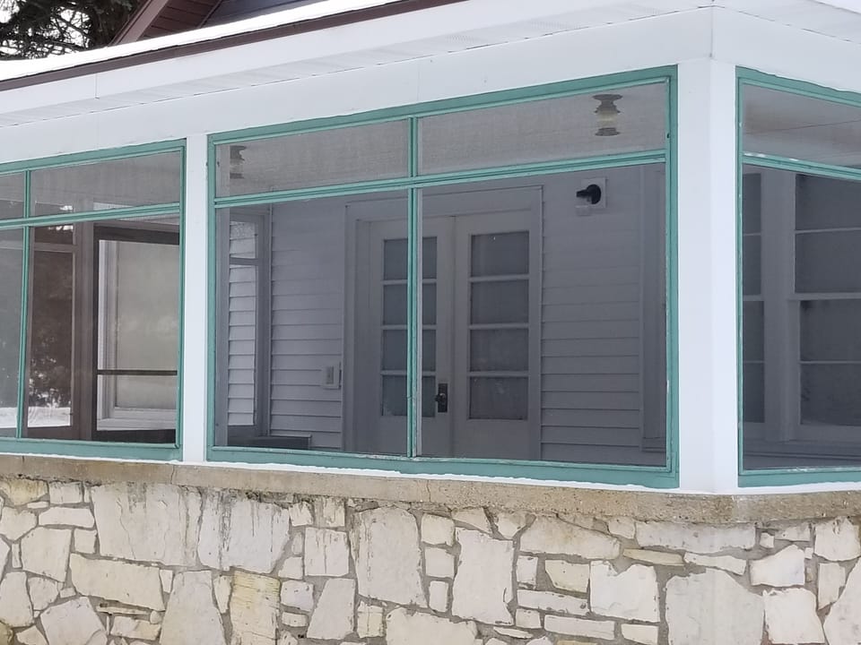 A very roomy screened porch allows for fun gatherings.
