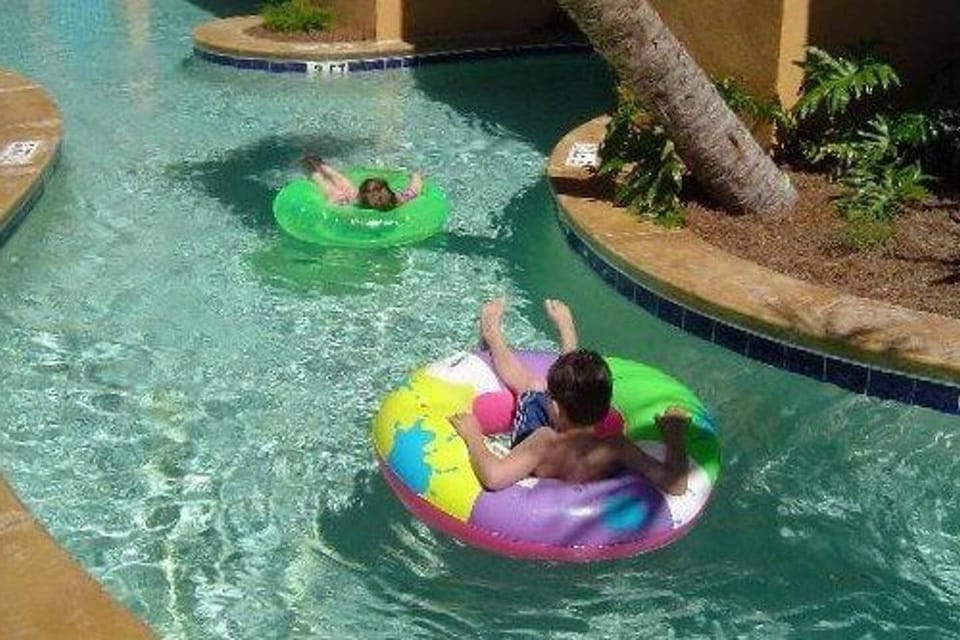 Take a dip in the resort's onsite pools, hot tub, lazy river, and kid play area!