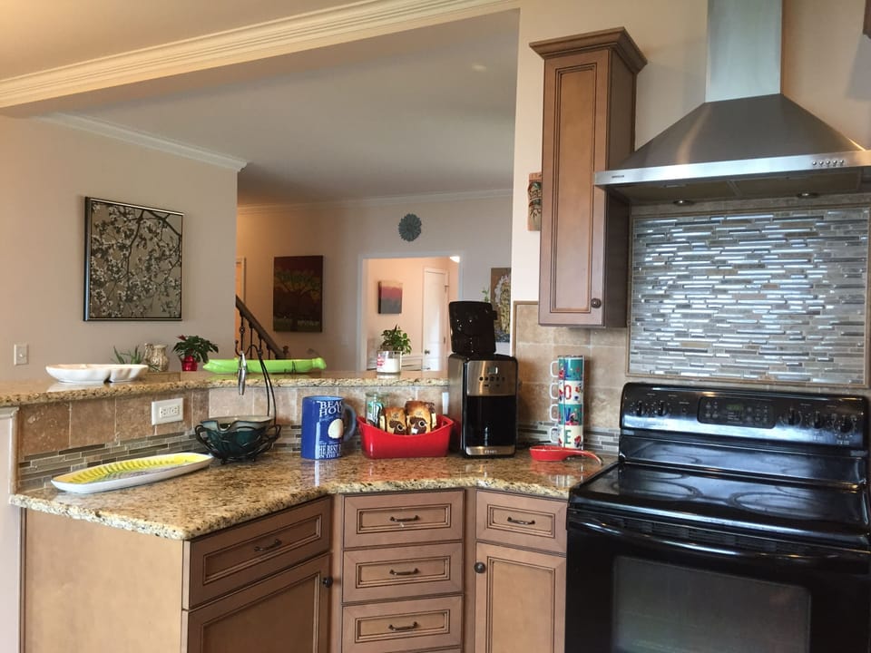 Kitchen with commercial venting system