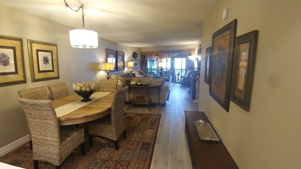 Dining area looking to the living area