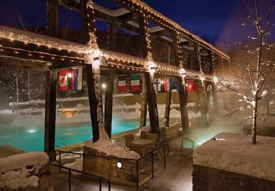 Outside Pool and whirlpools. Pool continues inside. 