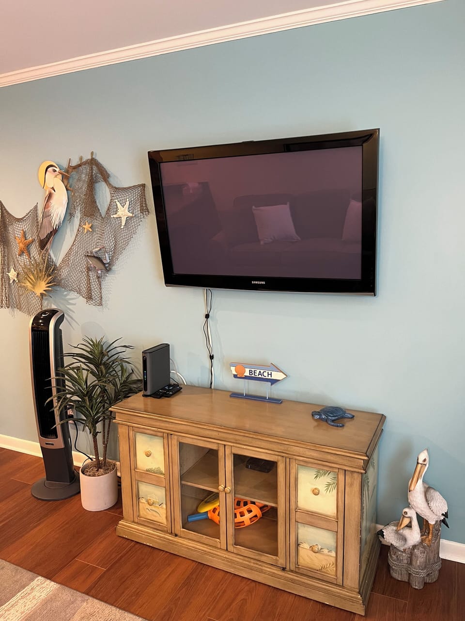 TV in Living Room. There is a Firestick with several Apps on it.