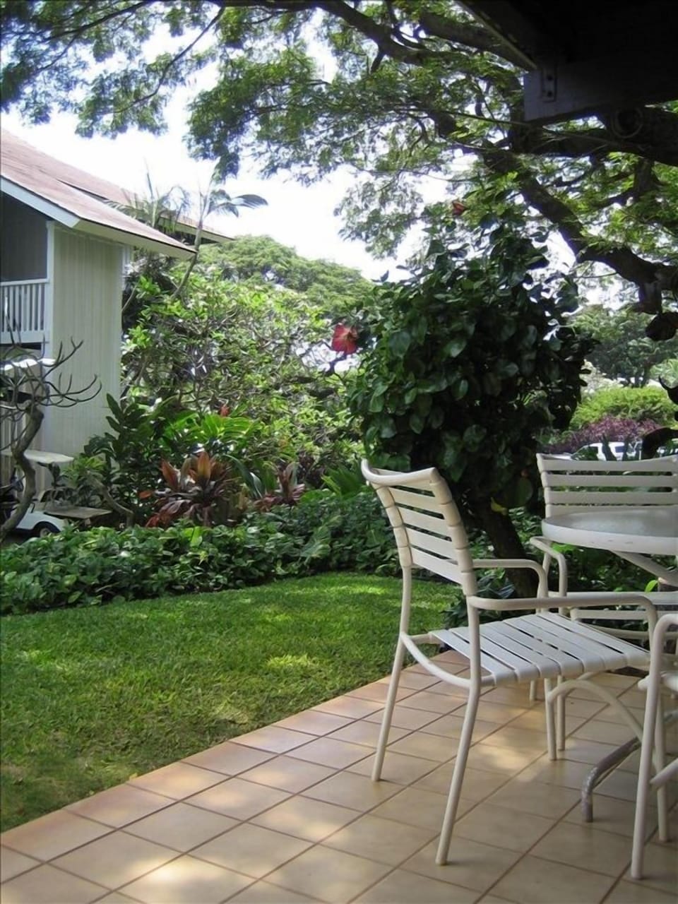 Filtered shade on private, covered lanai! View from lanai looking right.