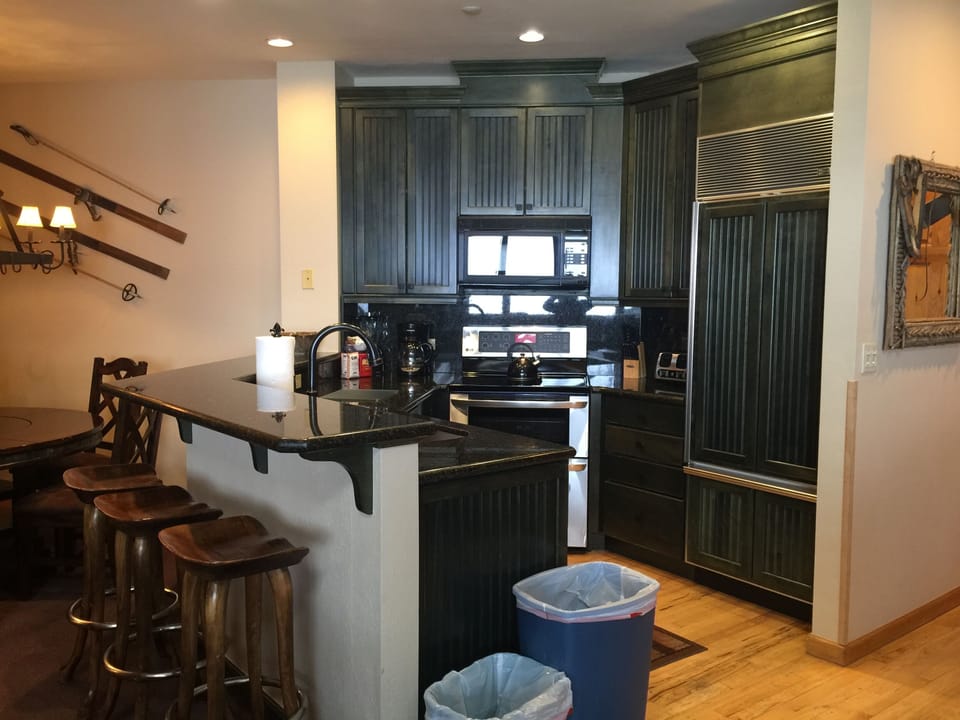 Kitchen with bar seating for 3