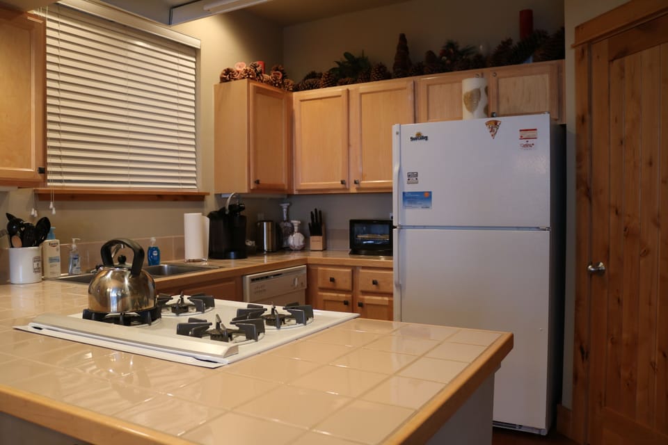Fully equipped kitchen with pantry.