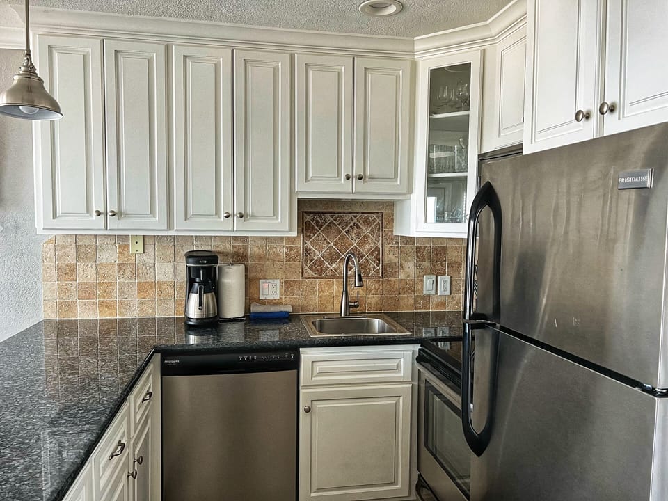 Fully equipped kitchen (microwave, oven,  fridge, dishwasher, coffee maker)