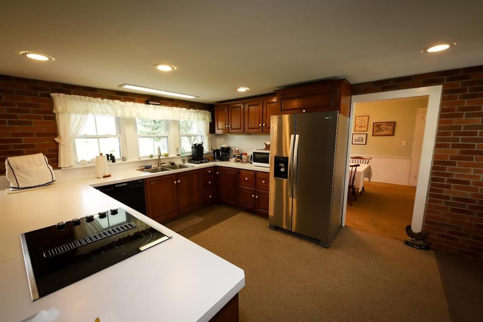 Large country kitchen with modern appliances.