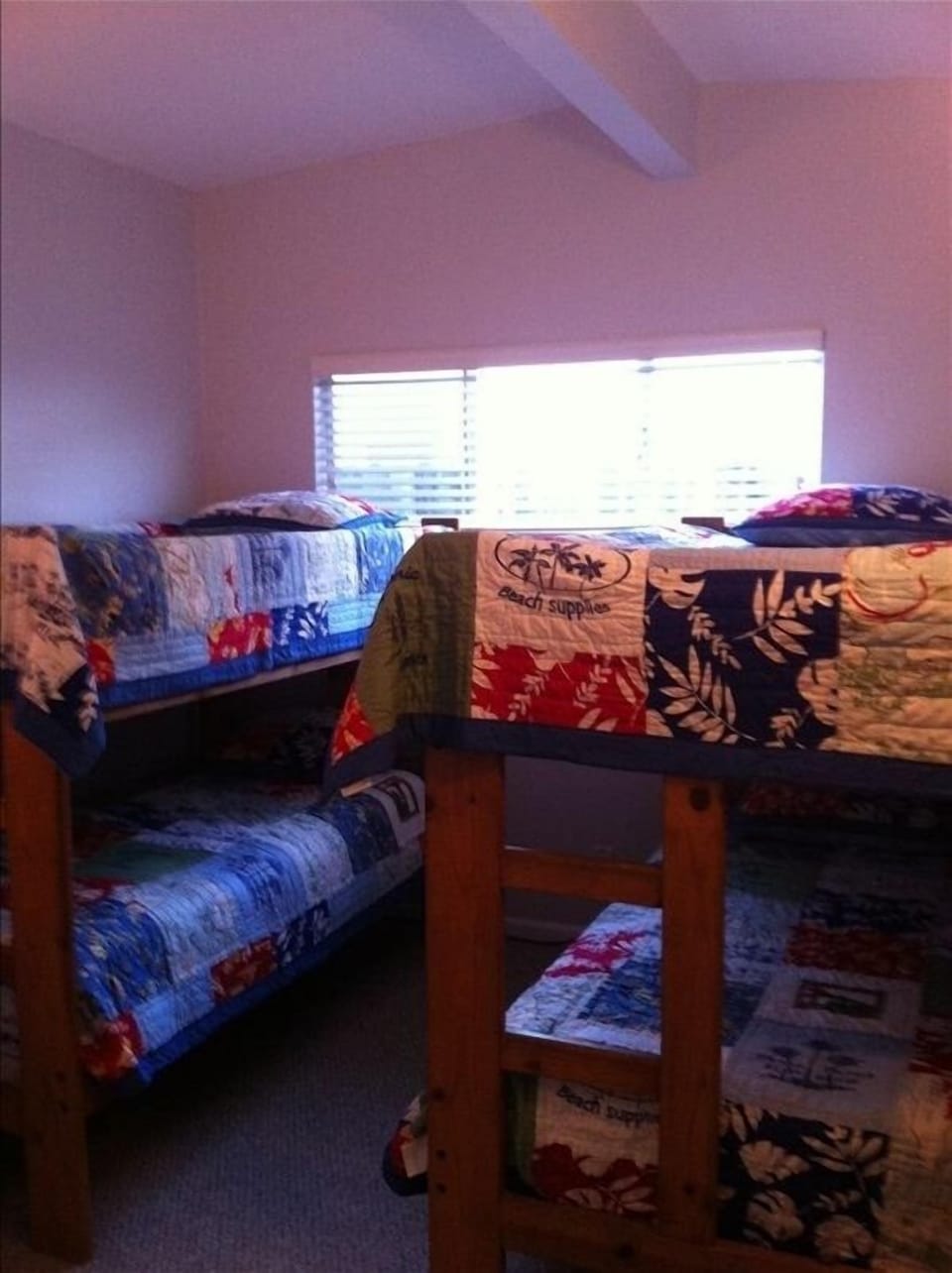 Bunk beds. Mounted TV in corner. 