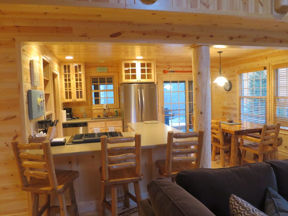 Open floor plan with kitchen, dining and living room.