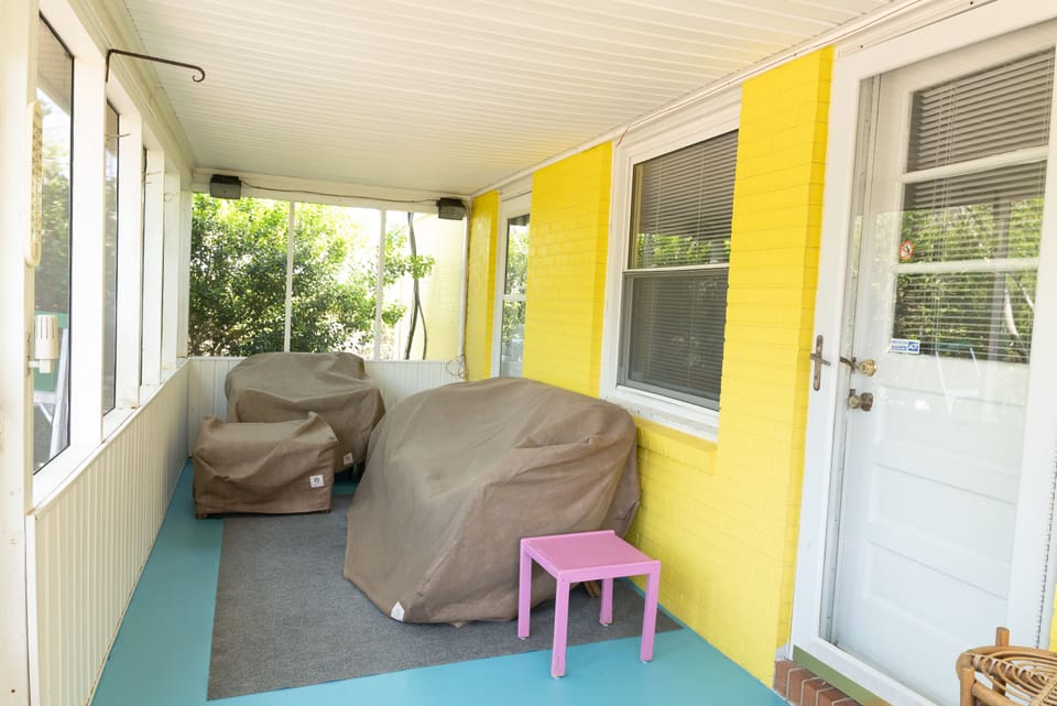 Outdoor screened porch.