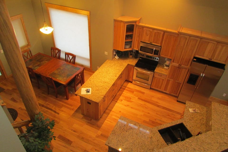 Kitchen and Dining view from the Loft, no charge for the vertigo.