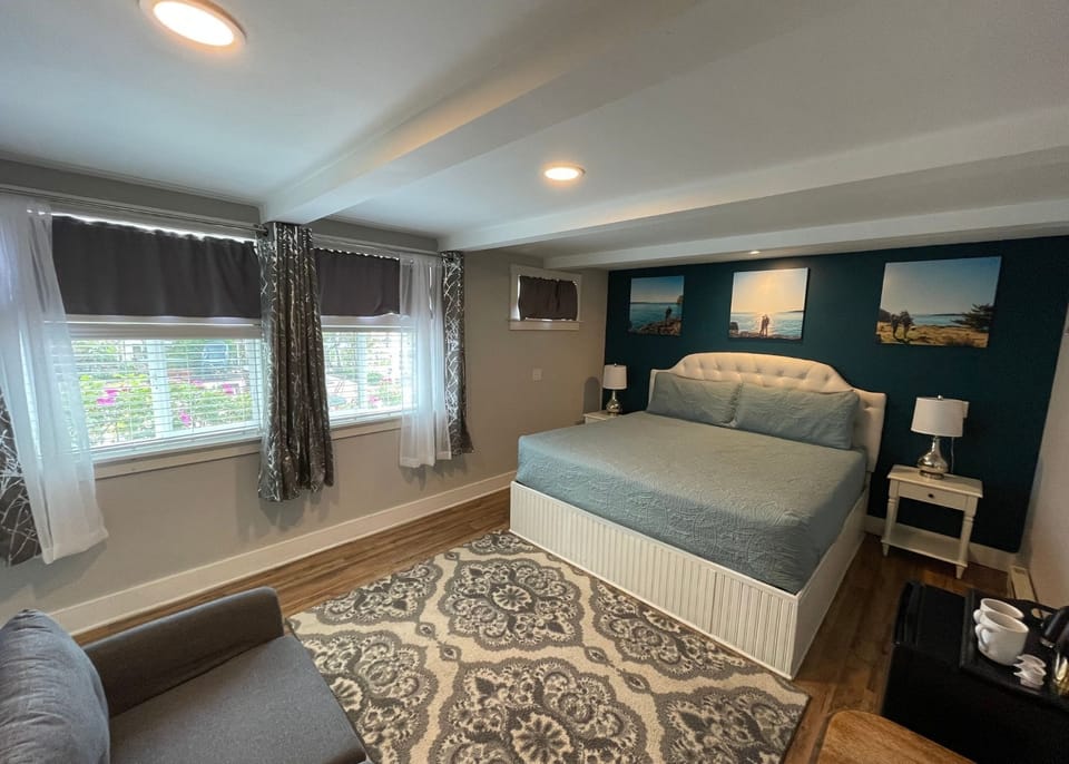 King bed and plenty of light with garden views and black-out curtains for sleep.