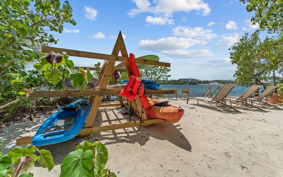 kayaks and paddle boards available for guest use
