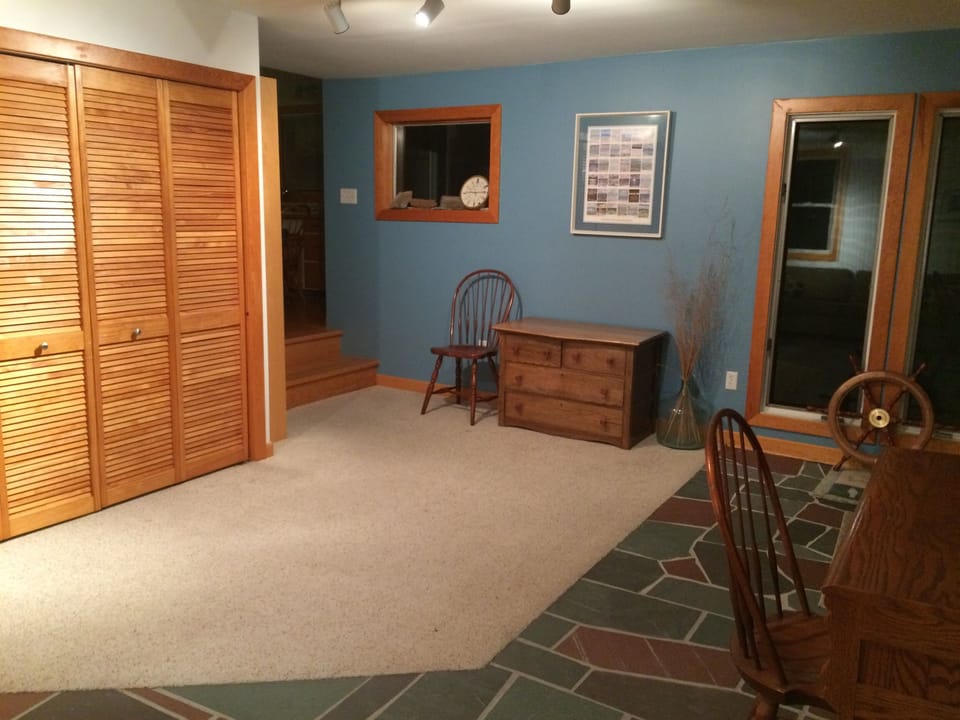 Other view of back room with laundry closet. Walk out to backyard. 