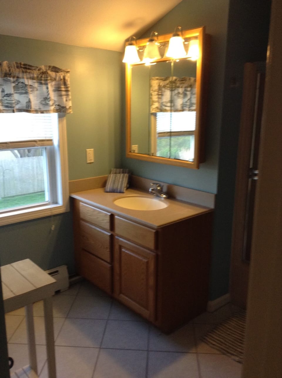 Upstairs bathroom with combo tub and shower