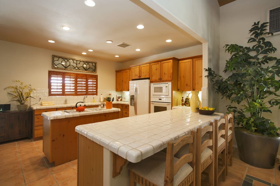 Kitchen and bar counter with stools