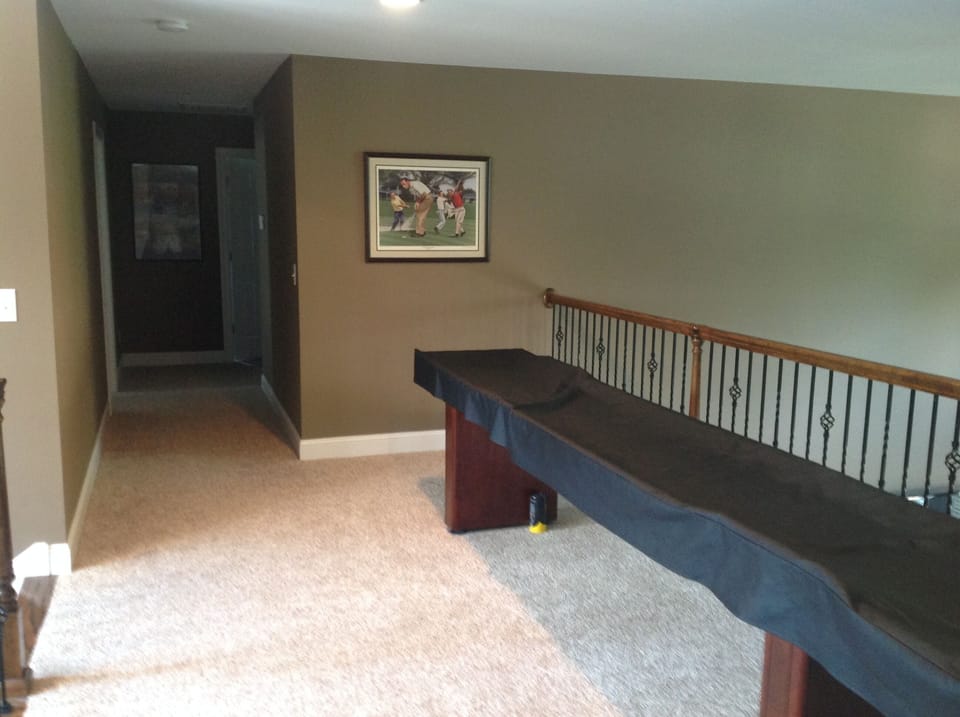 Shuffleboard table over great room