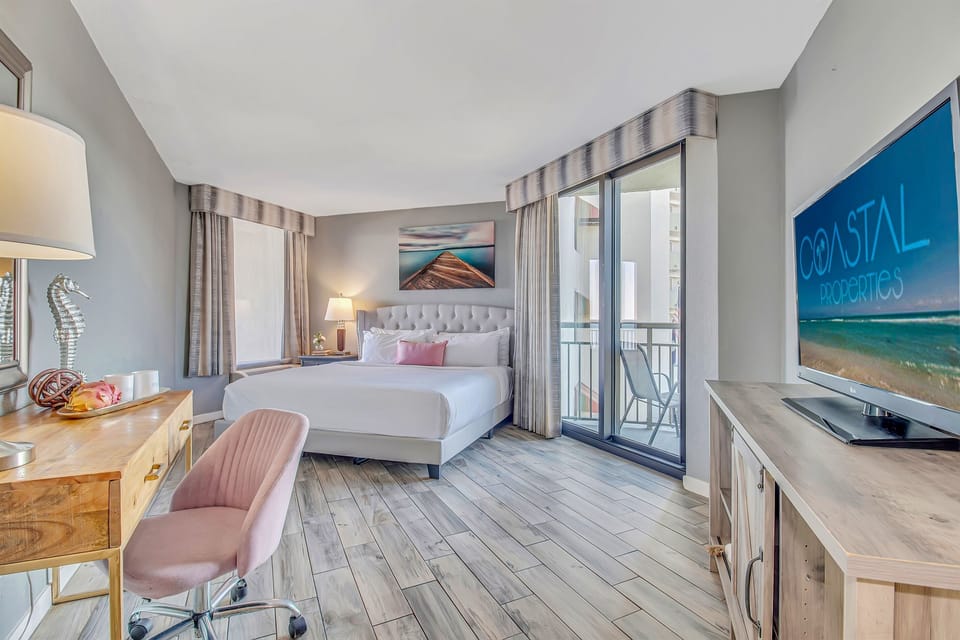 Indulge in a seaside sleeping haven, as the bed in our oceanview suite provides a comfortable and inviting space to recharge while enjoying the coastal scenery.