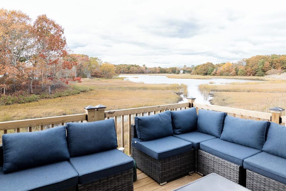 Deck with seating for 12 is the best part of this rental! Overlooking estuary. 