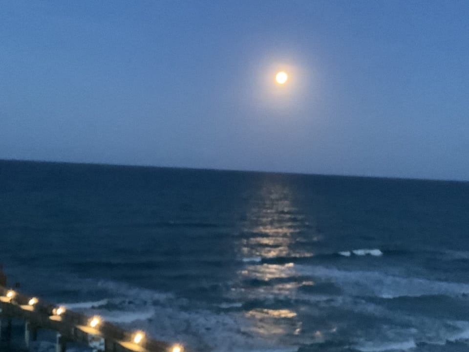 The moon on the ocean taken from the balcony
