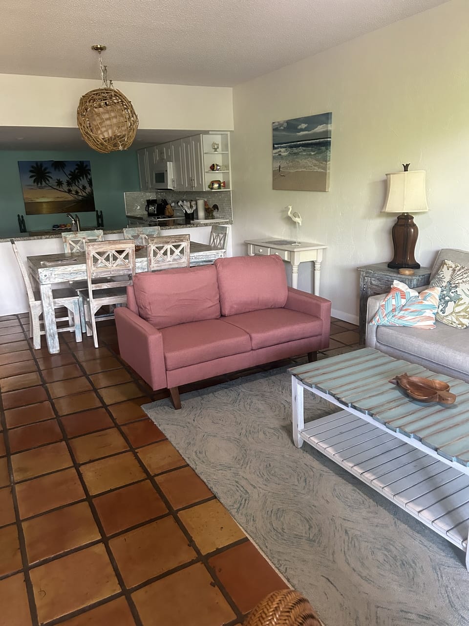 Living room with queen sleeper, love seat and two conversation chairs 
