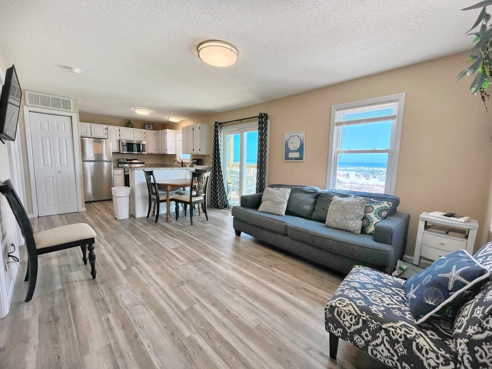 The living room includes a large, Smart TV to stream your favorite shows (user account required).