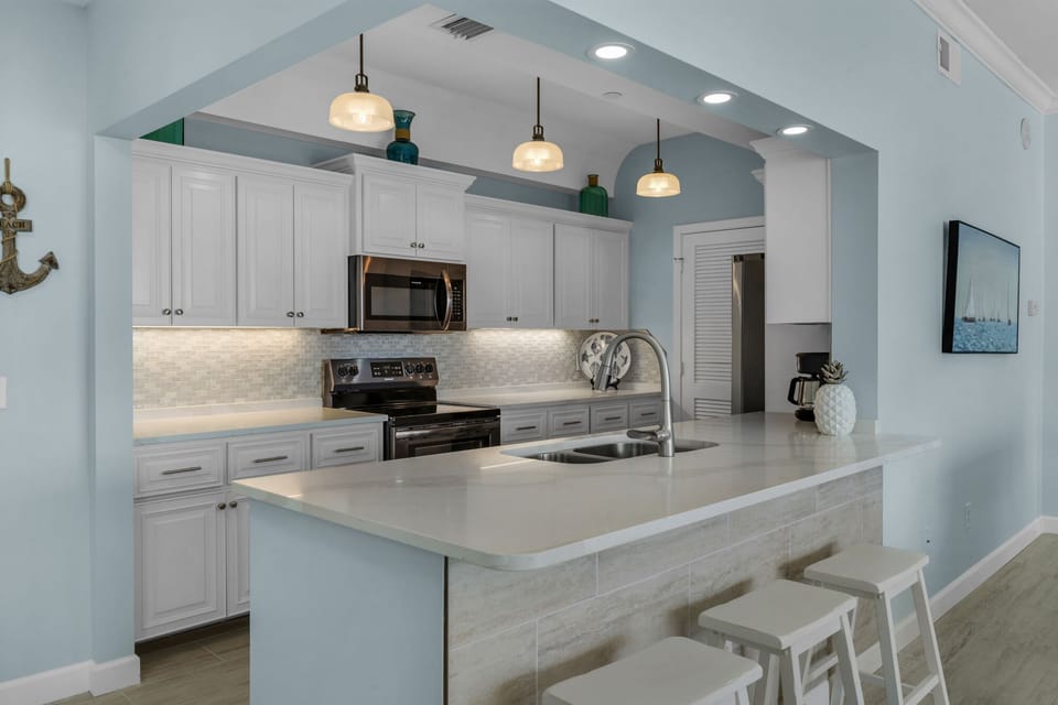 Completely remodeled kitchen. New counters, cabinets and backsplash