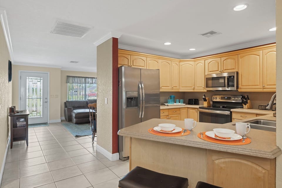 The kitchen is right off the living room toward the front of the house