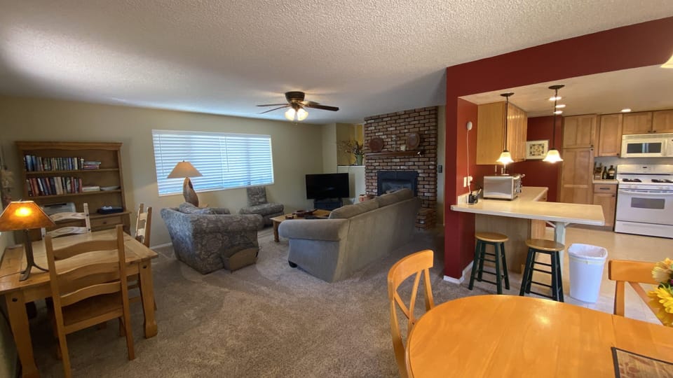 Main living area: Kitchen, living room, and dining table.