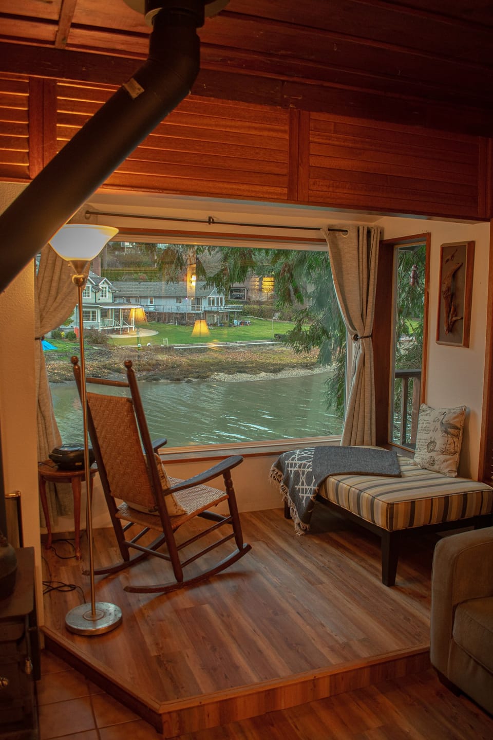 Living room nook overlooking cove (blackout curtains if using sofa sleeper).