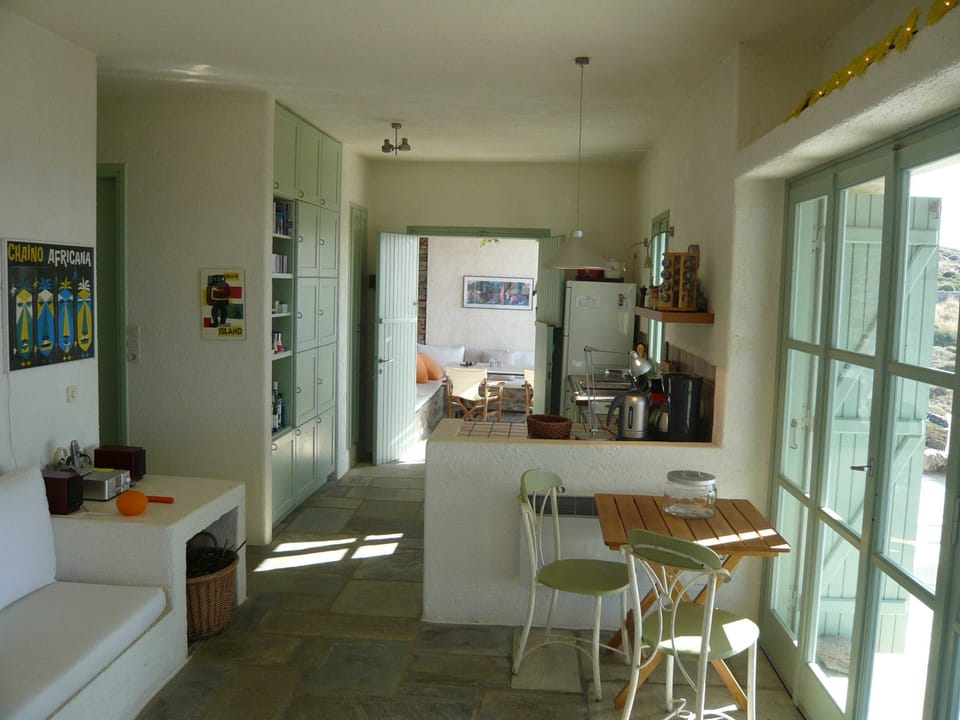 Kitchen and sitting room with view to the patio