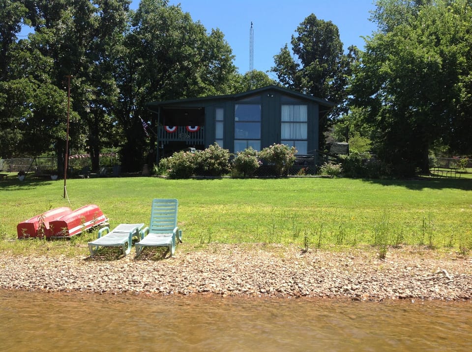 Shady yard to keep cool.  Clean shoreline. Lake is down a bit.