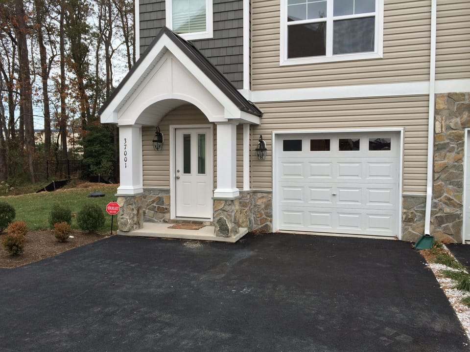 End Unit with plenty of parking compared to other units! Side-yard for the kids