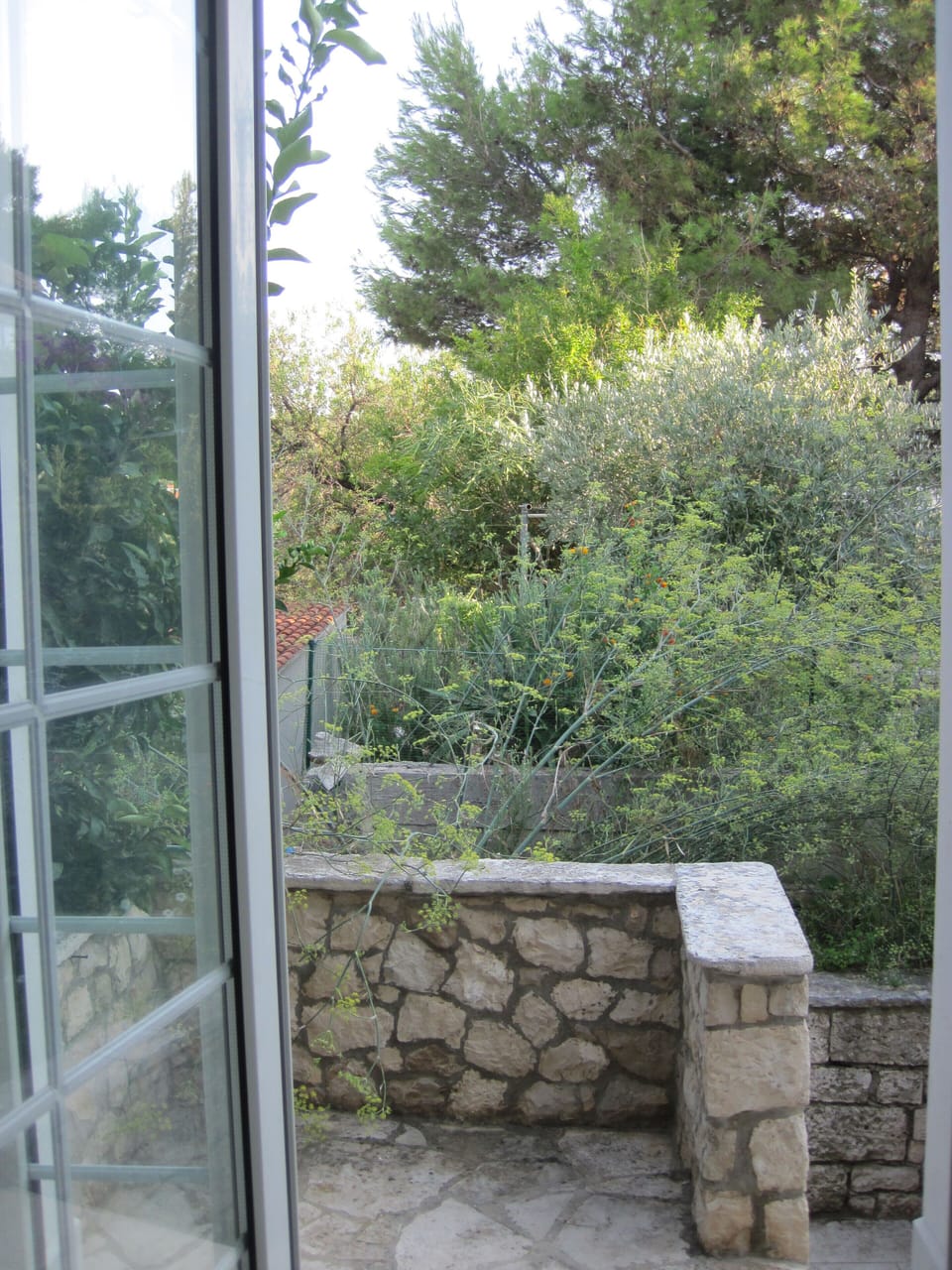 Upper studio apartments are entered through an outside stairway.