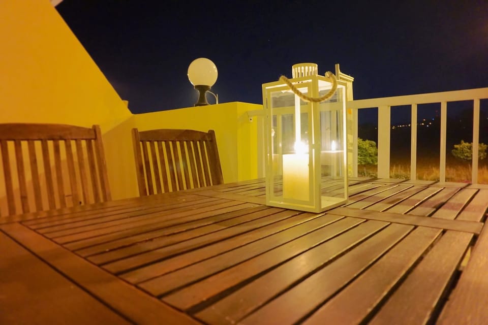 Relax on this large balcony whilst enjoying a glass of wine.