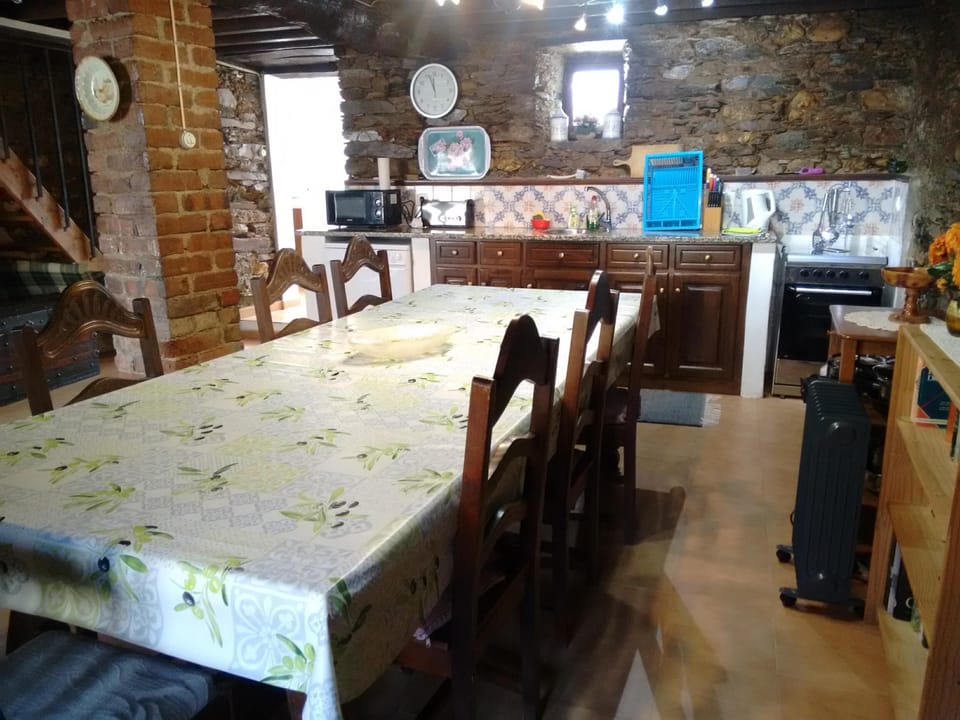 Kitchen with refectory dining table