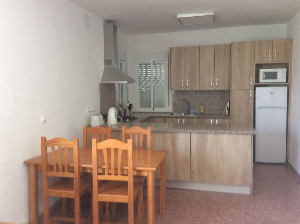 Dining area and American style kitchen