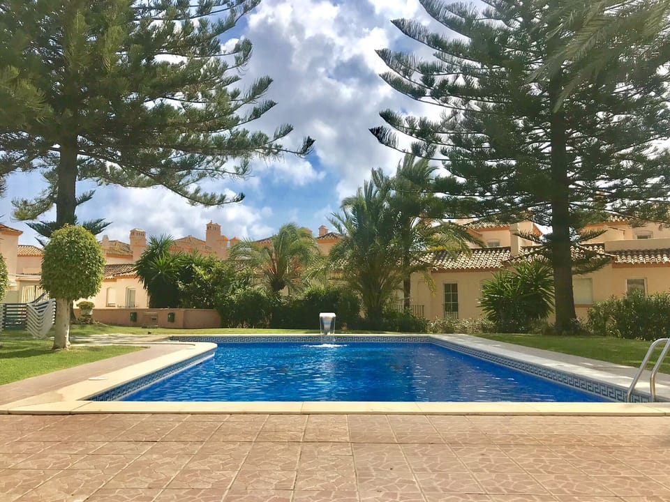 The gated pool with direct beach access.