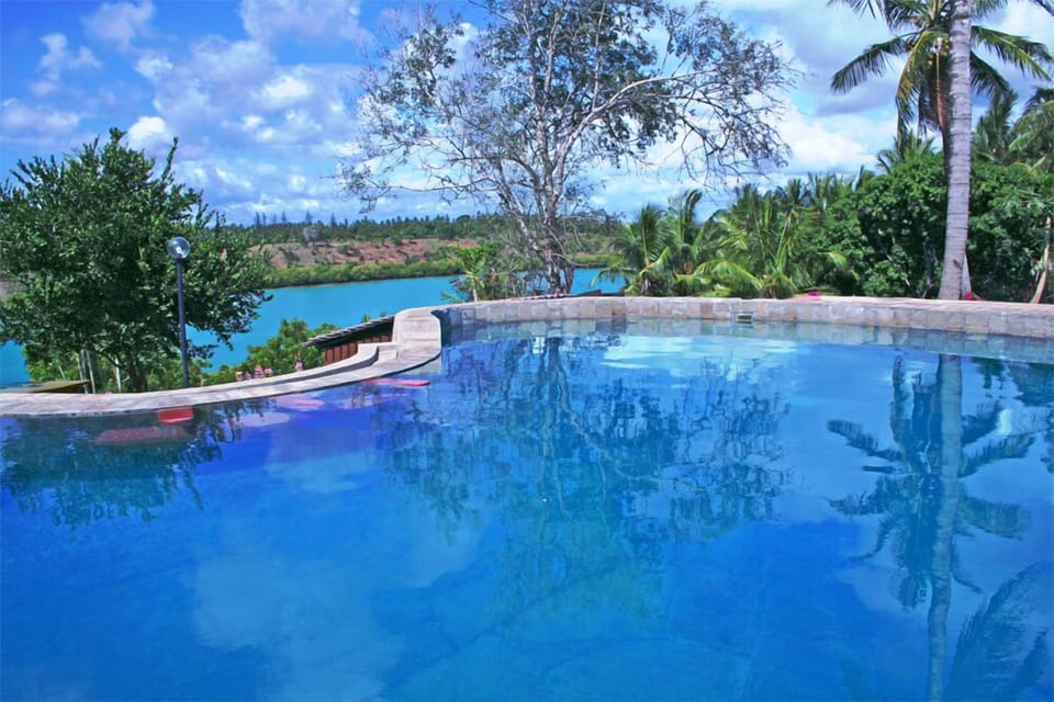 Huge natural stone tiles pool with stuning views