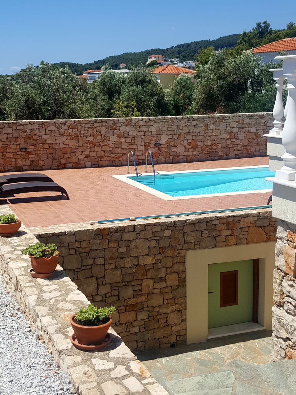 Lower apothiki ( store) housing pool toys and washing machine