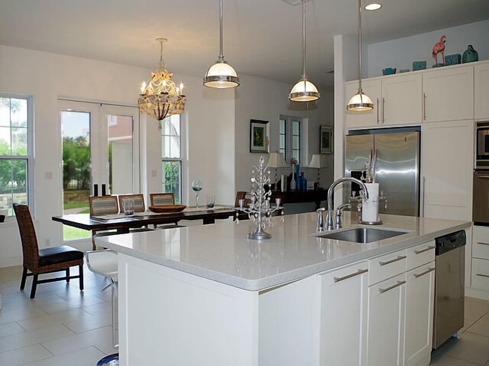 Open concept kitchen with large island and bar seating for six