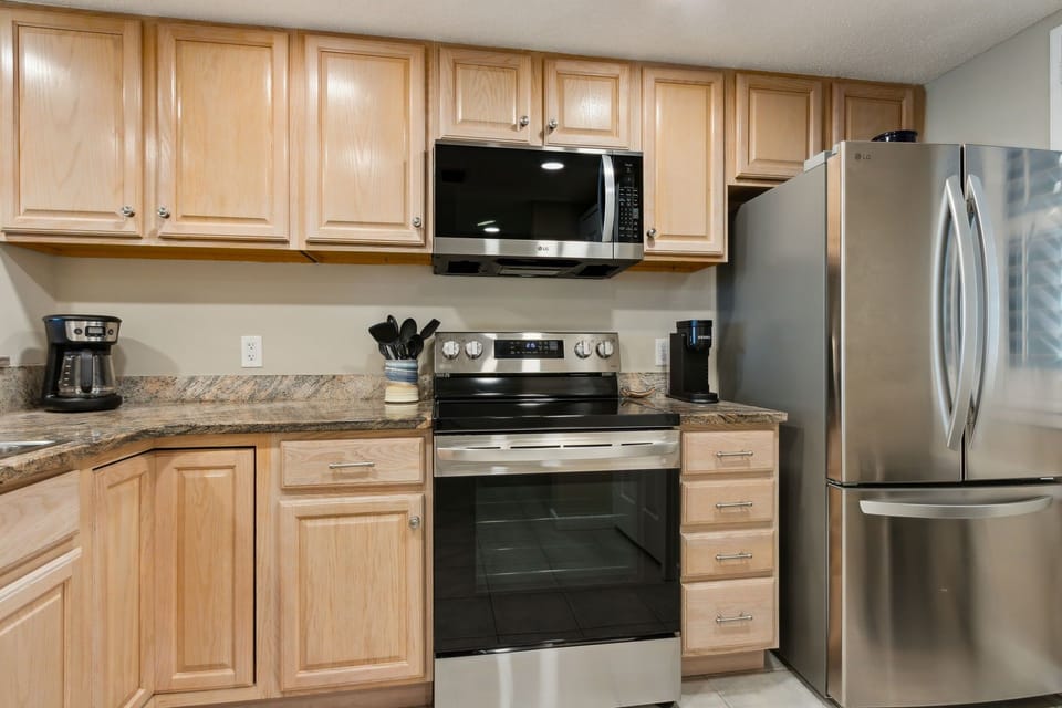 Fully Stocked Kitchen with Granite Countertops