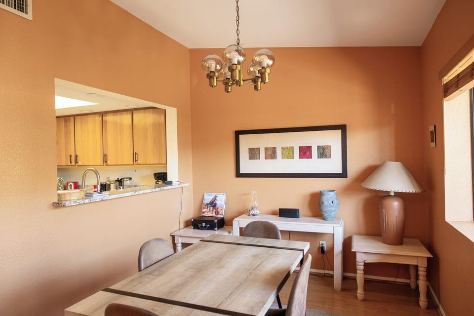 Dining space w/ kitchen pass-through -- easy for serving and gathering together